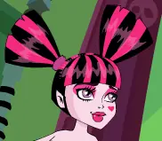 Draculaura and Clawd Wolf Monster High logo
