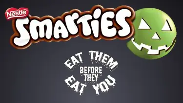 Nestlé Smarties Eat Them Before They Eat You logo